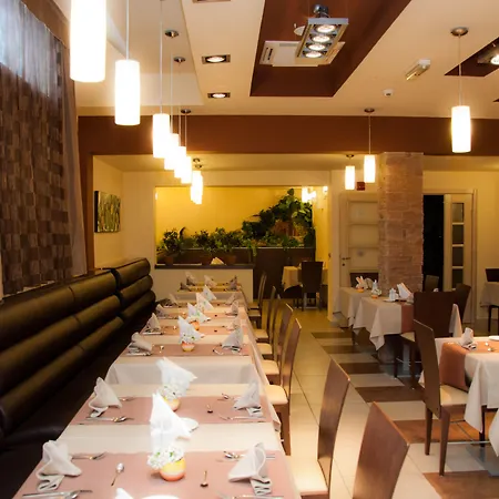 Garni Vigor - Ev Station Hotel