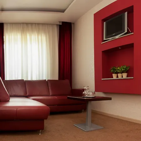 Garni Vigor - Ev Station Otel