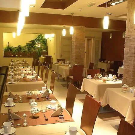 Garni Vigor - Ev Station Hotel 2*